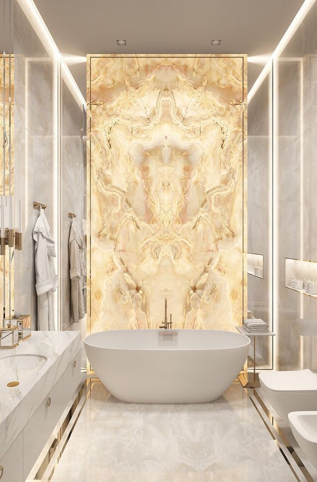 Luxury ensuite with gold-trimmed WPC feature wall and smart mirrors, designed for Toronto condos