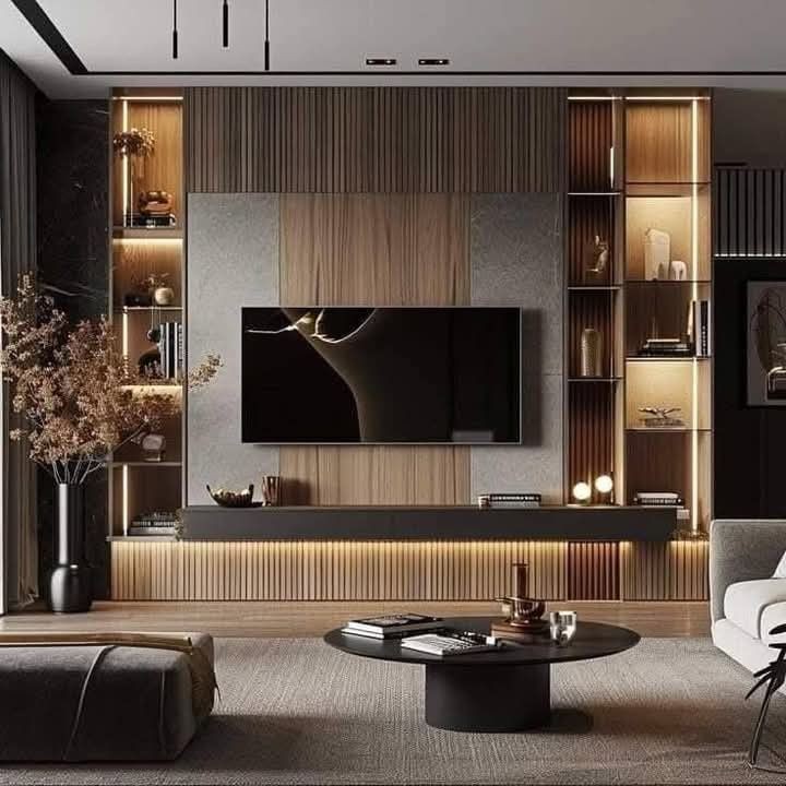 Designer sketching a dual-tone WPC TV wall layout for a Toronto client’s basement renovation